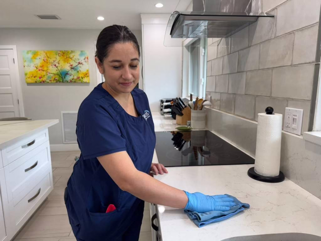 A Talent Cleaning Services professional deep cleaning a Fort Lauderdale home